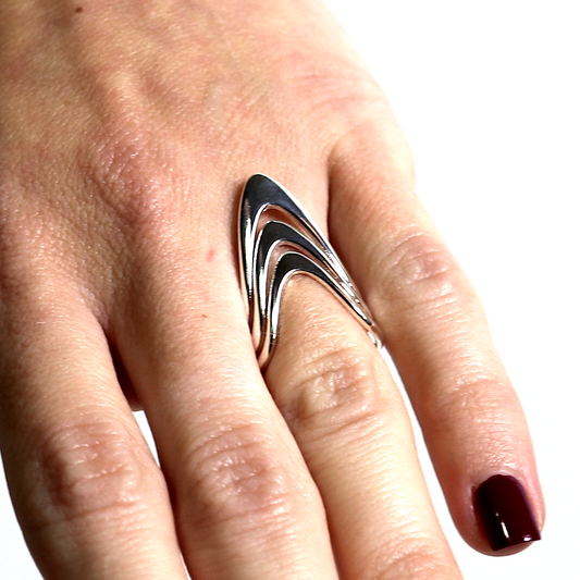 wave silver ring on model's hand