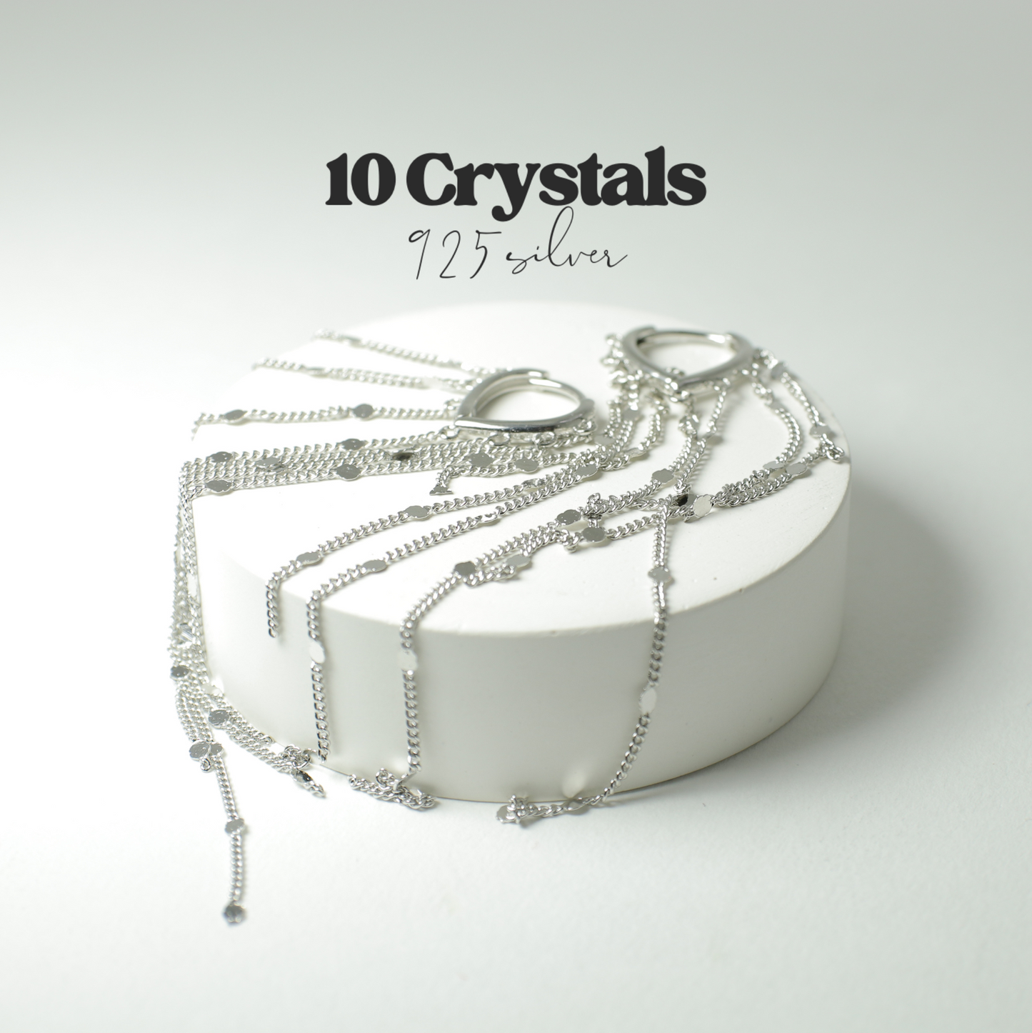 Сережки з довгими підвісками зі срібла 925 проби бренду 10 Crystals, демонструють витончений дизайн. Купуй зараз!