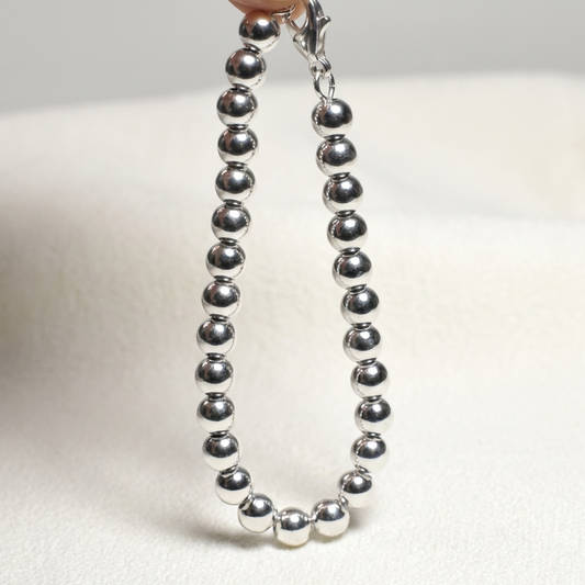 Срібний браслет з кульками. Міцна застібка. Родоване покриття. Браслет з намистинами. Безкоштовна доставка. Швидке віправлення. 