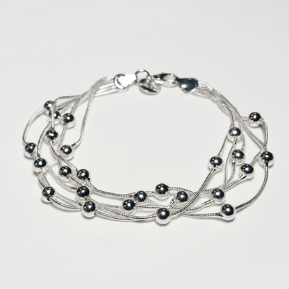 Срібний браслет багатошаровий для жінок — кульковий каскад. Родоване срібло. Безкоштовна доставка.