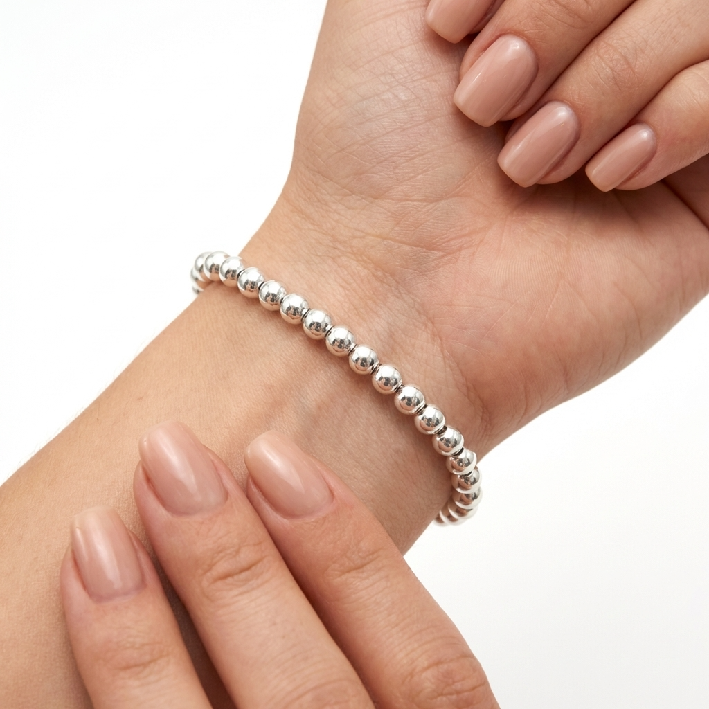 Срібний браслет з срібними кульками Олівія — це браслет з срібними перлинами. Безкоштовна доставка. Швидка відправка.